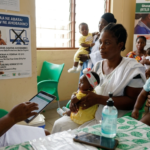 Infant receiving malaria vaccine at a health facility in Ghana amid US aid deal dispute