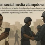 Gabon’s social media clampdown: Illustration of Gabonese gendarmes checking civilians’ phones during a reported social media crackdown in Gabon, with a worried man holding a smartphone in the foreground