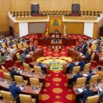 Ghana tax policy debate in parliament chamber Accra