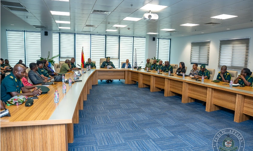 Ghana e-visa system training session involving GIS officers in Accra.