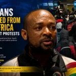 Ghanaian nationals gathered at OR Tambo airport before repatriation flight from South Africa.