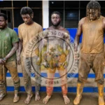 Armed suspects arrested during anti-galamsey raid near Ankobra River in Ghana.