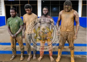 Armed suspects arrested during anti-galamsey raid near Ankobra River in Ghana.