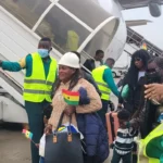Ghanaian evacuees arrive in Accra after being repatriated from South Africa during a government-led evacuation operation.