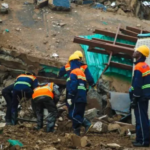 Emergency responders search through rubble following the collapse of a four-storey building at Avenor in North Kaneshie, Accra.