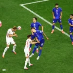 Harry Kane heads th ball into the net