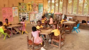 Children learning in a kindergarten classroom in Ghana.