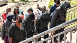 Students under police escort in Kenya after deadly Utumishi Girls Academy fire investigation.