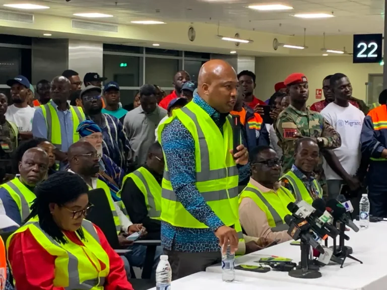 Ghana Foreign Affairs Minister Samuel Okudzeto Ablakwa greets Ghanaian evacuees arriving at Kotoka International Airport from South Africa.