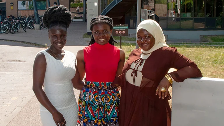 Franciska Arhinful, Jemimah Mensah and Fadila Issah after completing master's degrees at the University of Cambridge.