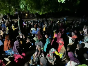 Freed Boko Haram captives gather overnight after a rescue operation in Borno State, northeastern Nigeria.