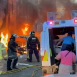 Glider bus on fire during disorder in Belfast following a knife attack.