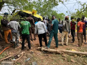 Ghana National Fire Service personnel conduct rescue operations after a trailer crash in Kariminga.