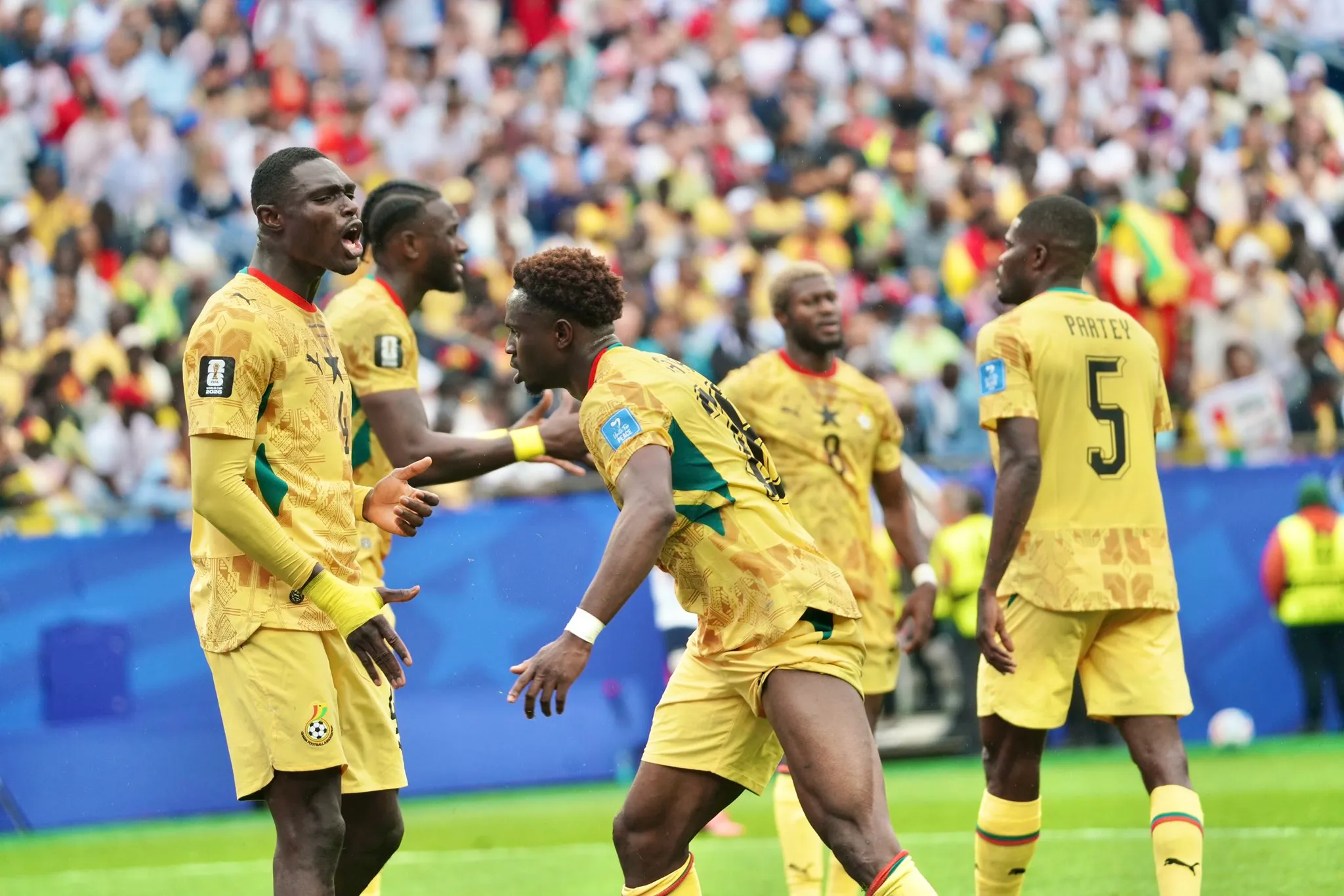Ghana players defend against England during World Cup draw