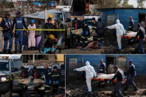 Police and forensic investigators at the scene of a mass shooting in Johannesburg, South Africa