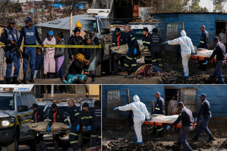 Police and forensic investigators at the scene of a mass shooting in Johannesburg, South Africa