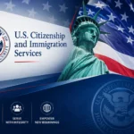 US Citizenship and Immigration Services branding displayed alongside the Statue of Liberty and the United States flag.