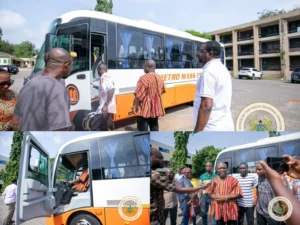 Officials inspect and unveil a new Metro Mass Transit bus during a transport improvement initiative in Ghana's Volta Region.