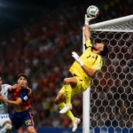 Cape Verde goalkeeper Vozinha makes a crucial save against Spain at the World Cup.
