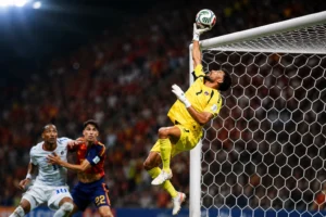 Cape Verde goalkeeper Vozinha makes a crucial save against Spain at the World Cup.