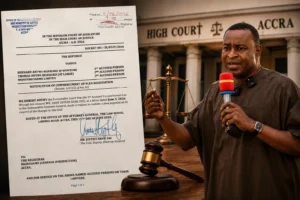 Bernard Antwi-Boasiako AKA Wontumi with court document relating to plea negotiation proceedings in Accra