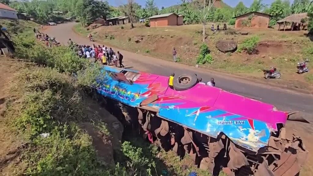 Overturned school bus following a fatal crash in eastern Uganda that killed pupils returning from a school trip.