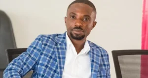 Dennis Miracles Aboagye speaking during a public event before his reported arrest by Ghana's Economic and Organised Crime Office.