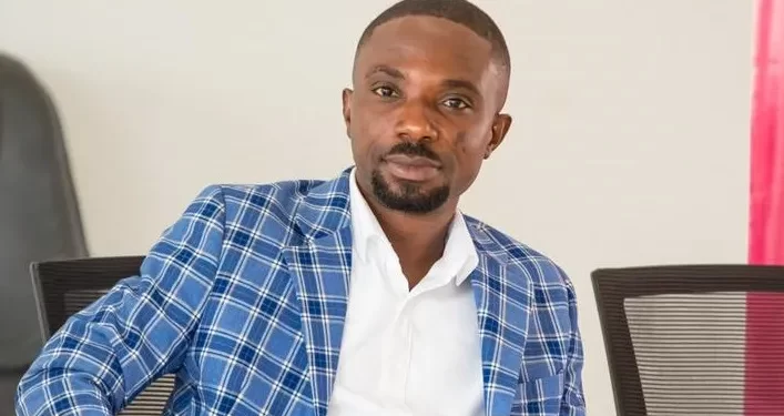 Dennis Miracles Aboagye speaking during a public event before his reported arrest by Ghana's Economic and Organised Crime Office.