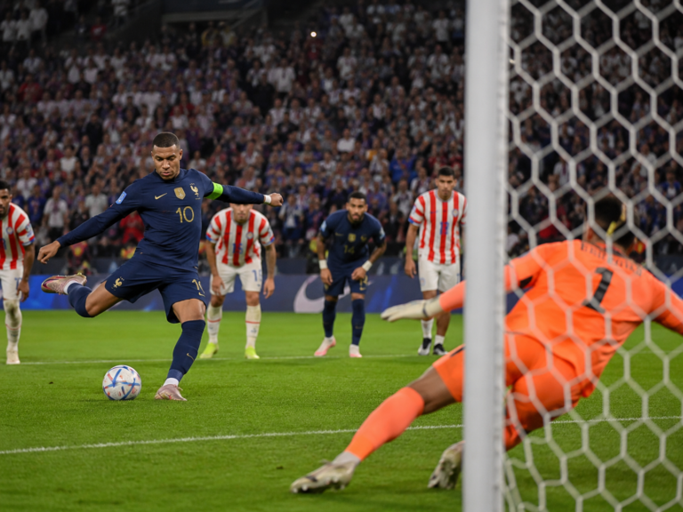 Kylian Mbappé taking a penalty