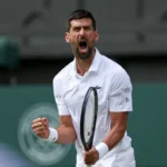 Novak Djokovic celebrates victory after defeating Felix Auger-Aliassime in the Wimbledon quarter-finals.