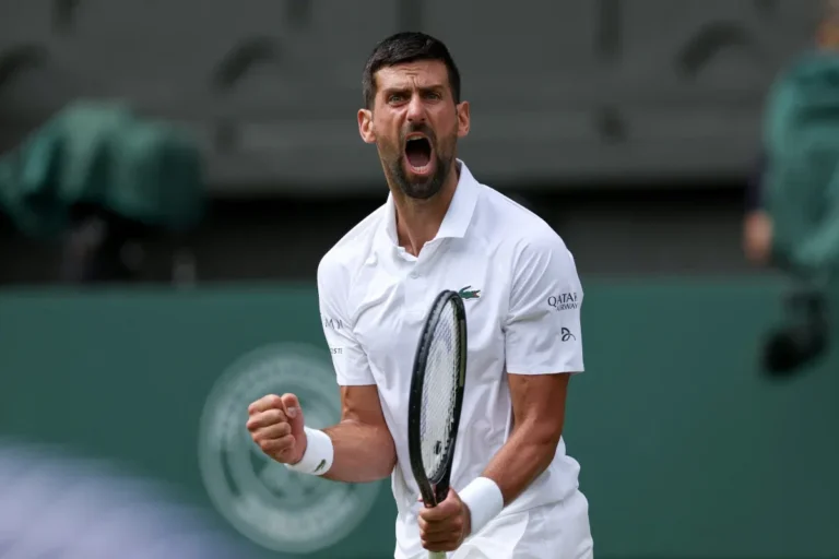 Novak Djokovic celebrates victory after defeating Felix Auger-Aliassime in the Wimbledon quarter-finals.