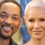 Will Smith and Jada Pinkett Smith posing together at a public event.