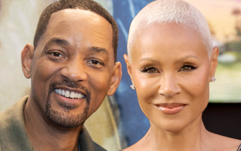 Will Smith and Jada Pinkett Smith posing together at a public event.
