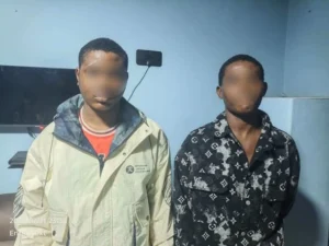 Two suspects arrested by Ghana Police during a Tamale murder investigation.