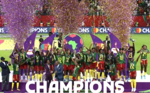 Cameroon players celebrate after beating Malawi 3-0 to win the 2026 Women's Africa Cup of Nations.