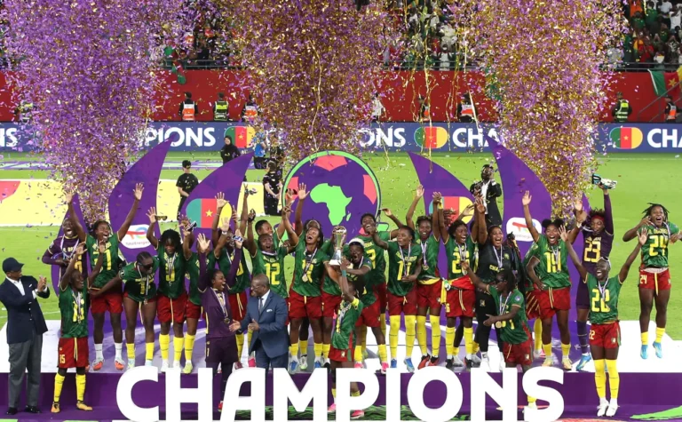 Cameroon players celebrate after beating Malawi 3-0 to win the 2026 Women's Africa Cup of Nations.